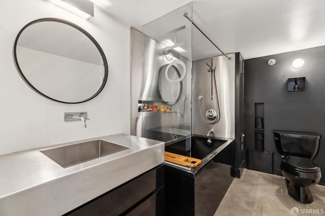 full bathroom featuring toilet, concrete flooring, vanity, and bathing tub / shower combination