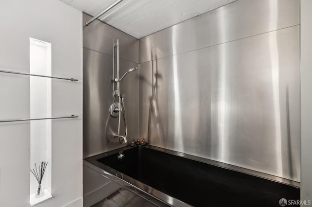 interior space featuring bathtub / shower combination