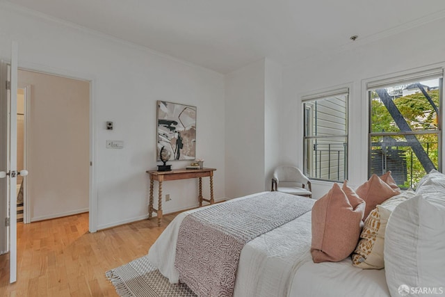 605 Carolina St, San Francisco, CA 94107 - bedroom featuring light wood-type flooring and crown molding