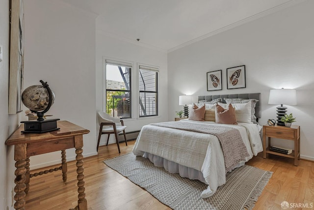 605 Carolina St, San Francisco, CA 94107 - bedroom featuring crown molding and light wood-style floors