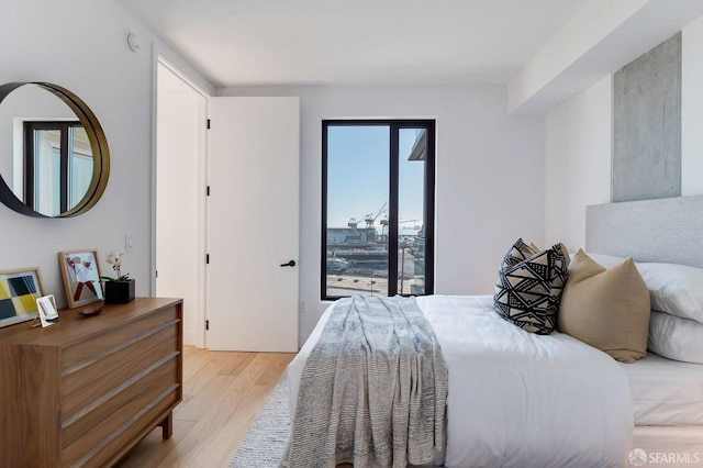 bedroom with light hardwood / wood-style flooring