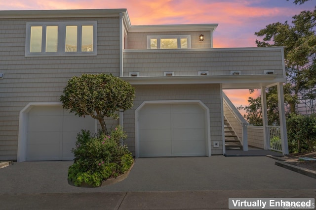 multi unit property with a garage and stairway