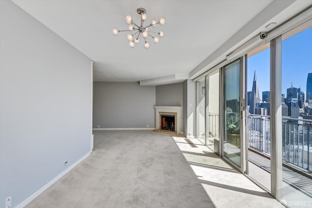 unfurnished living room featuring light carpet and a notable chandelier