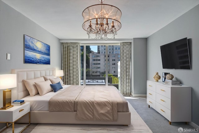 bedroom with a chandelier