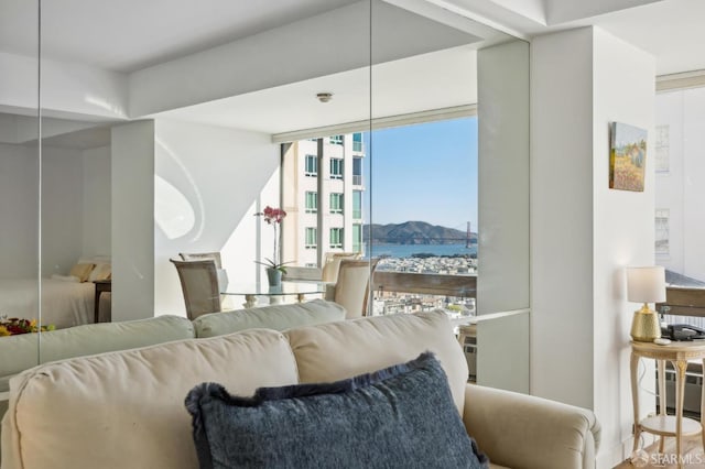 living room featuring a water view