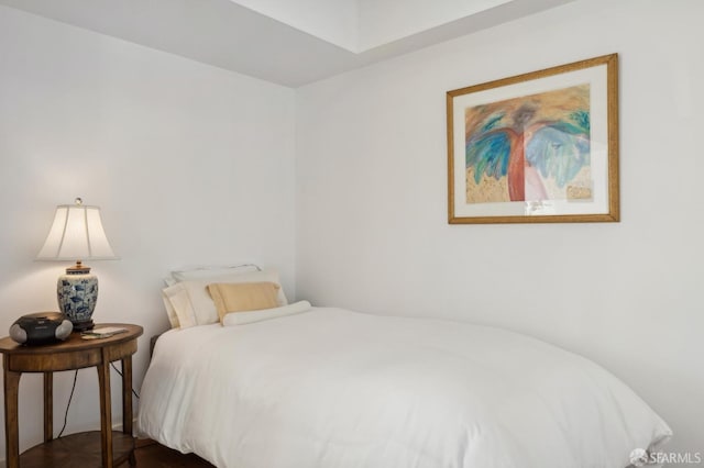 bedroom featuring dark wood-type flooring