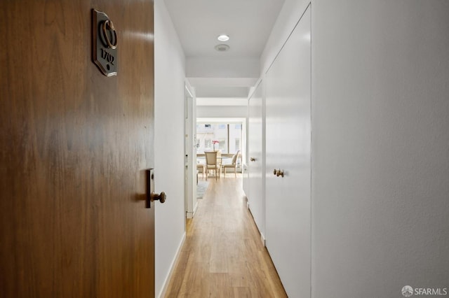 corridor featuring light wood-type flooring