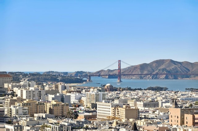 city view with a water and mountain view