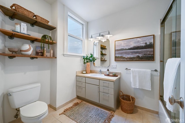 1630 Clay St Unit 4, San Francisco, CA 94109 - bathroom with vanity, toilet, tile patterned floors, shower / bath combination with glass door, and baseboards