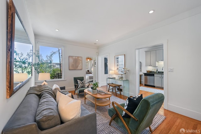1630 Clay St Unit 4, San Francisco, CA 94109 - living room with light wood finished floors, baseboards, and recessed lighting