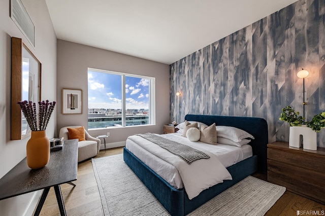 bedroom featuring hardwood / wood-style floors