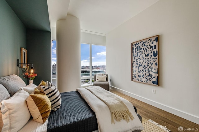 bedroom featuring hardwood / wood-style flooring