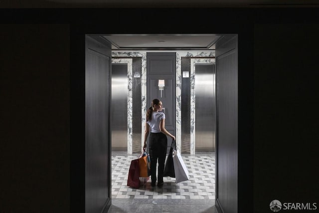 hallway featuring ornamental molding