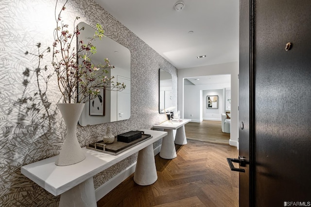 bathroom featuring parquet flooring