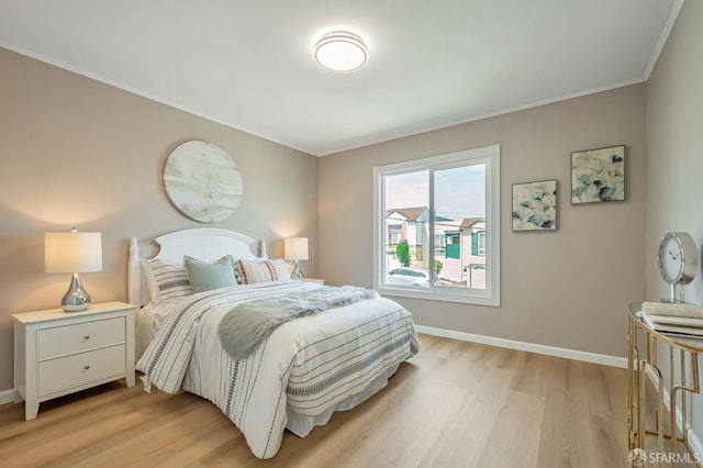 141 Cambridge St, San Francisco, CA 94134 - bedroom with light wood-style flooring, baseboards, and ornamental molding