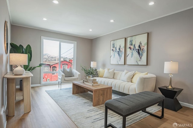 141 Cambridge St, San Francisco, CA 94134 - living area with light wood-style floors, ornamental molding, recessed lighting, and baseboards