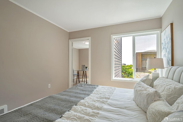 141 Cambridge St, San Francisco, CA 94134 - bedroom with multiple windows and ornamental molding
