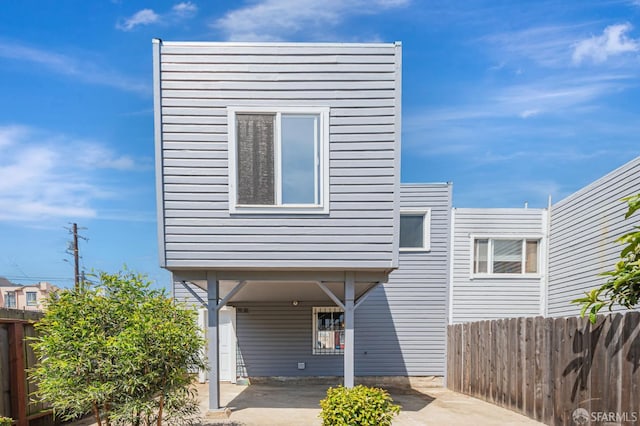 141 Cambridge St, San Francisco, CA 94134 - view of front of house featuring fence and a patio area