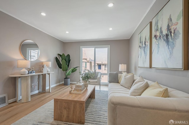 141 Cambridge St, San Francisco, CA 94134 - living area featuring wood finished floors, baseboards, recessed lighting, and crown molding