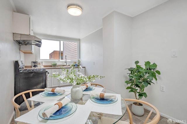 141 Cambridge St, San Francisco, CA 94134 - dining space featuring baseboards and ornamental molding