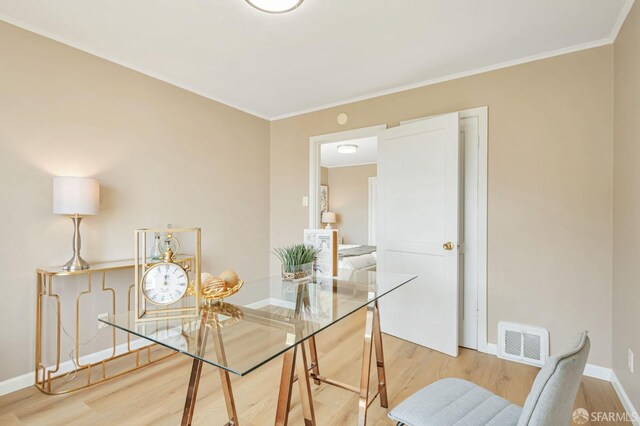 141 Cambridge St, San Francisco, CA 94134 - dining area featuring wood finished floors, baseboards, and crown molding