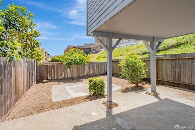 141 Cambridge St, San Francisco, CA 94134 - view of patio with a fenced backyard