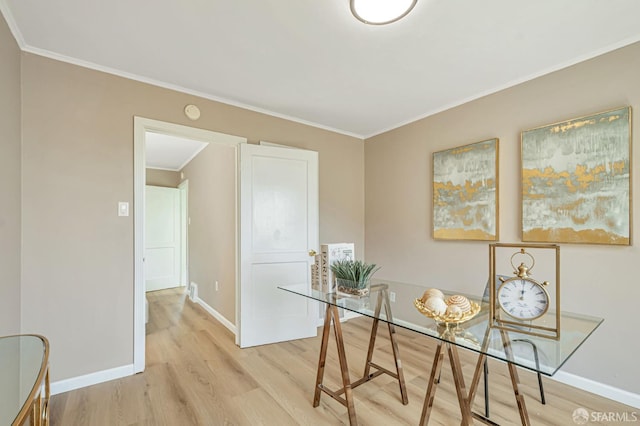 141 Cambridge St, San Francisco, CA 94134 - home office with light wood-type flooring, ornamental molding, and baseboards