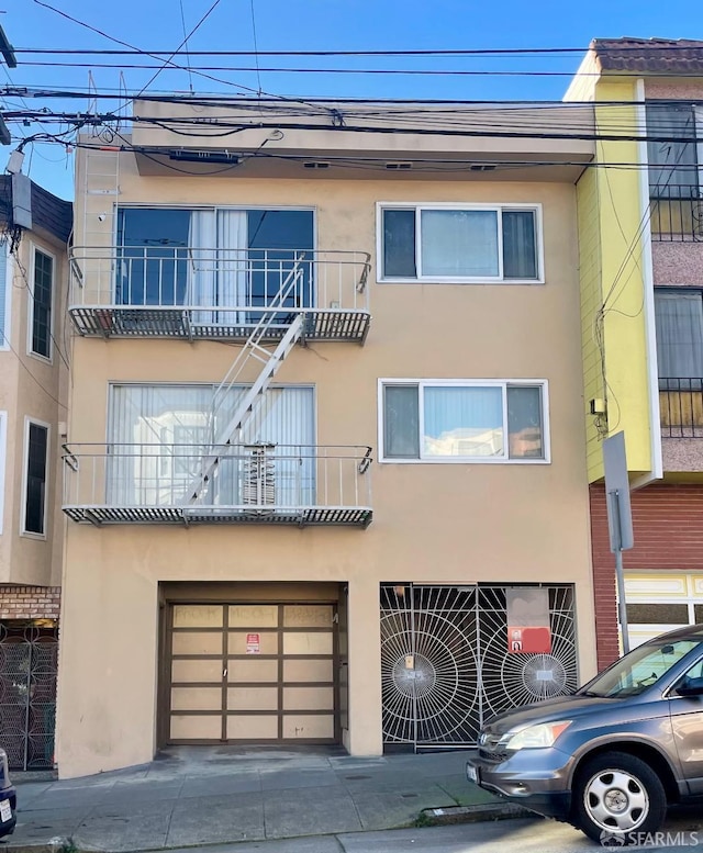 view of property featuring a garage