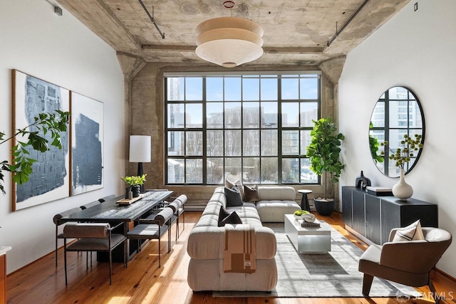 sitting room with light wood-style floors