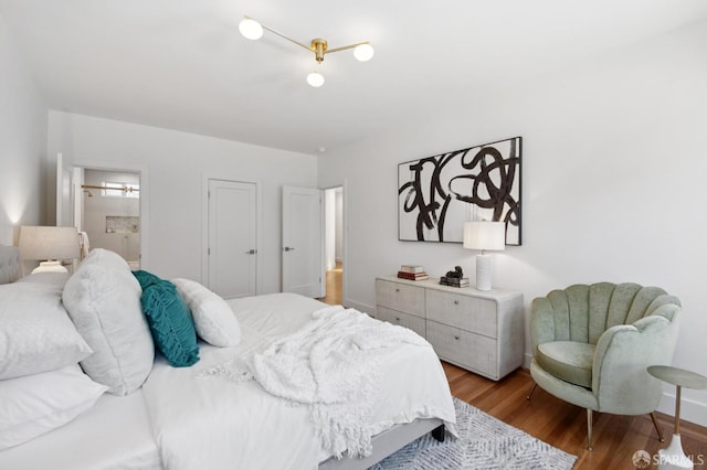 3445 Fillmore St, San Francisco, CA 94123 - bedroom featuring wood finished floors and connected bathroom