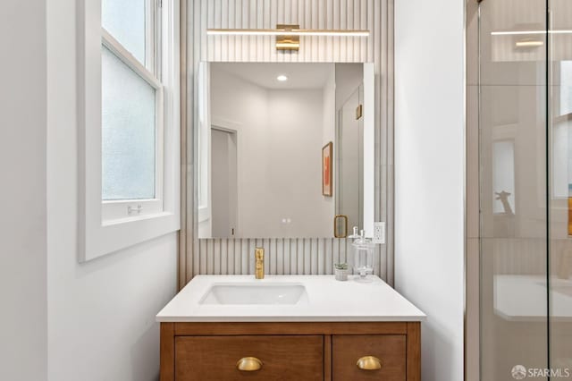 3445 Fillmore St, San Francisco, CA 94123 - bathroom featuring vanity, healthy amount of natural light, and a shower stall
