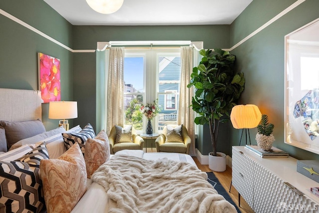 30 Lloyd St, San Francisco, CA 94117 - bedroom featuring multiple windows, wood finished floors, and baseboards