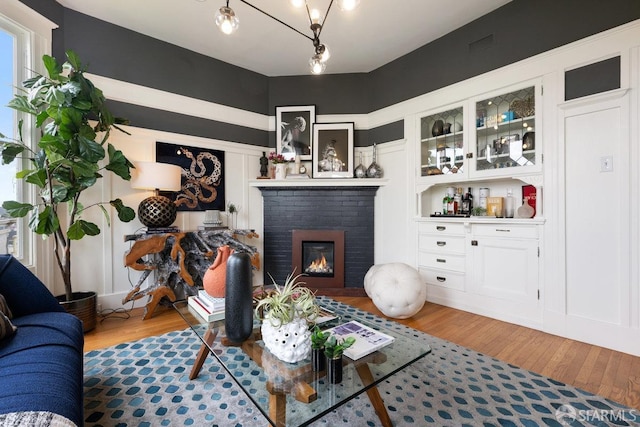 30 Lloyd St, San Francisco, CA 94117 - living area with wood finished floors and a brick fireplace