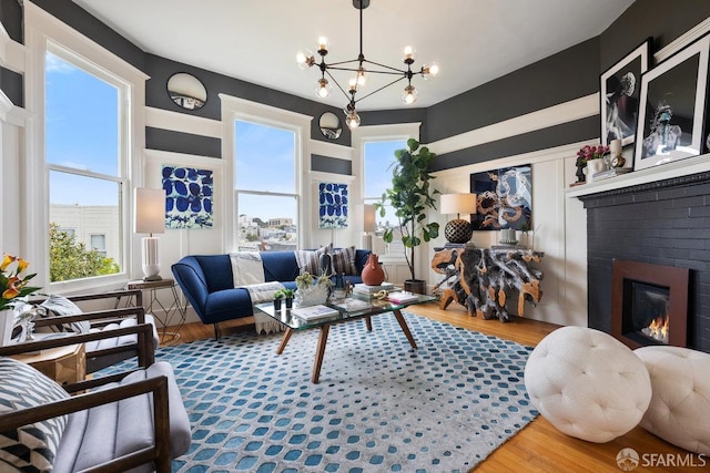 30 Lloyd St, San Francisco, CA 94117 - living area with a chandelier, wood finished floors, and a fireplace