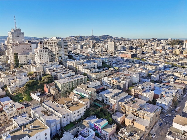 birds eye view of property featuring a city view