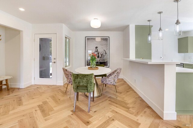 dining area featuring baseboards and recessed lighting