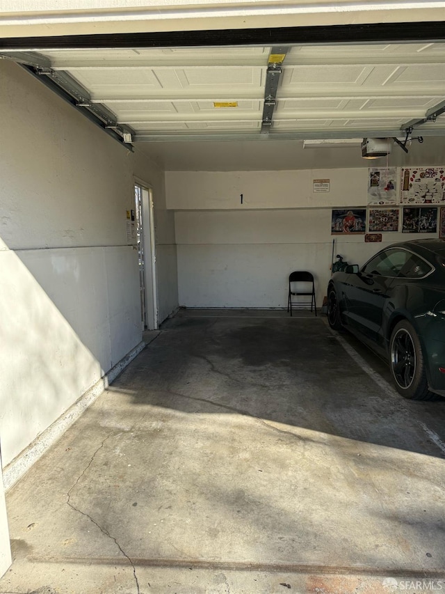 garage featuring a garage door opener