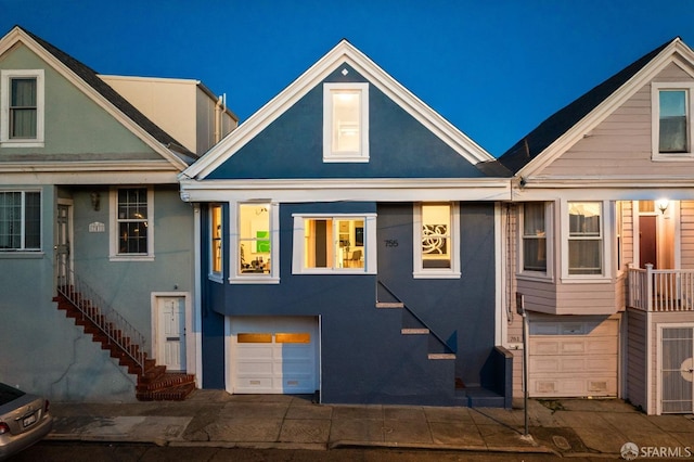 view of front of property featuring an attached garage