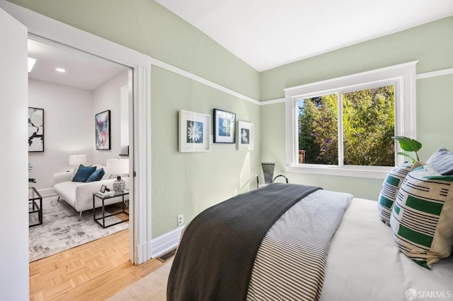 bedroom featuring baseboards