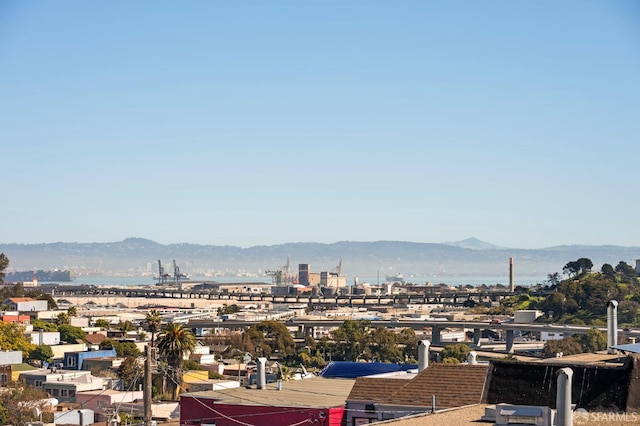 view of mountain feature with a view of city