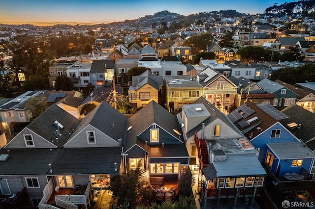 aerial view at dusk with a residential view