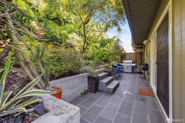 view of patio / terrace with fence