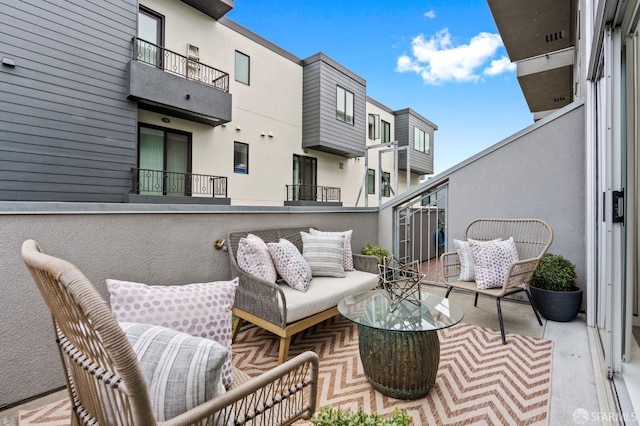 balcony with an outdoor hangout area