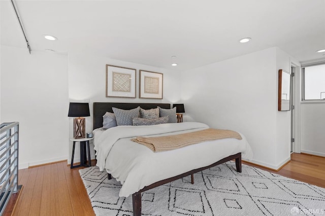 bedroom featuring light hardwood / wood-style floors