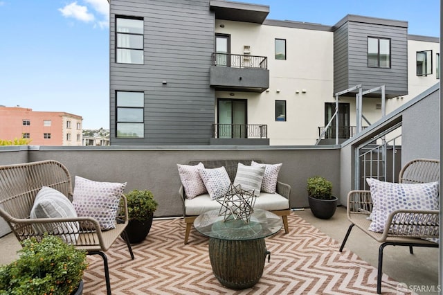 view of patio / terrace with a balcony