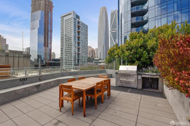 338 Main St Unit 6E, San Francisco, CA 94105 - view of patio featuring a view of skyline, outdoor dining area, and a sink