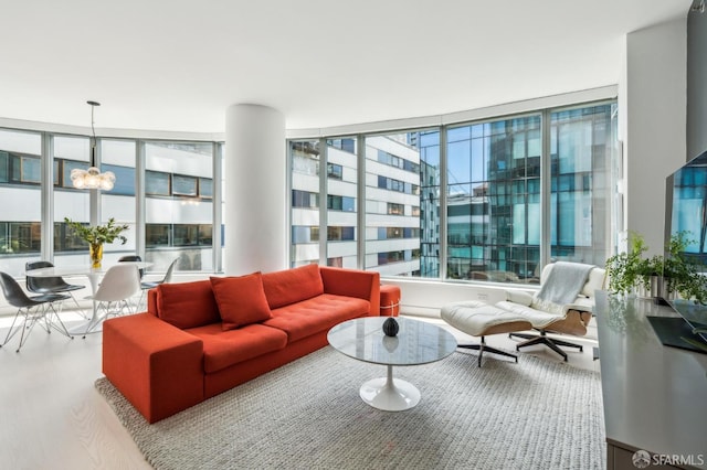 338 Main St Unit 6E, San Francisco, CA 94105 - living room featuring a chandelier and wood finished floors
