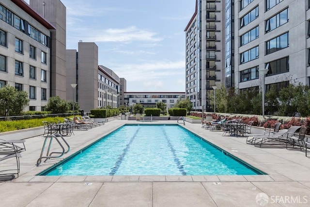 community pool with a patio