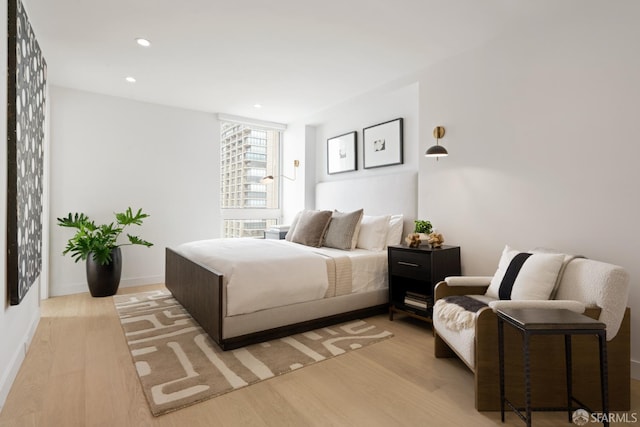 1070 Green St Unit 801, San Francisco, CA 94133 - bedroom featuring wood finished floors and recessed lighting