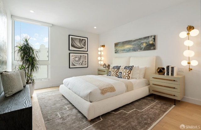 1070 Green St Unit 801, San Francisco, CA 94133 - bedroom with wood finished floors and recessed lighting